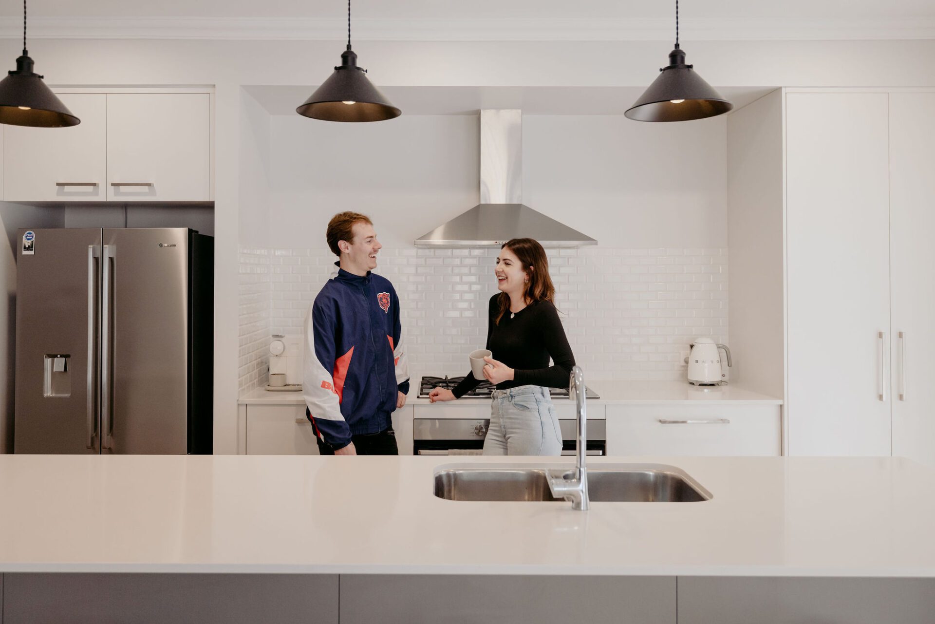 First home buyers, Skylar and Dylan in their new kitchen of their first home in Dalyellup, South West region of Western Australia, built by WA Country Builders.