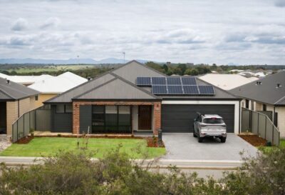 WA Country Builders home design in WA, single storey brick home with rooftop solar panels and double driveway
